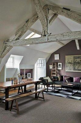 These stunning ceiling beams add a rustic and urban feel to this curved ceiling!