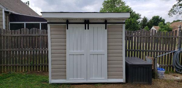 Custom shed made from Recycled materials built from the Ground up