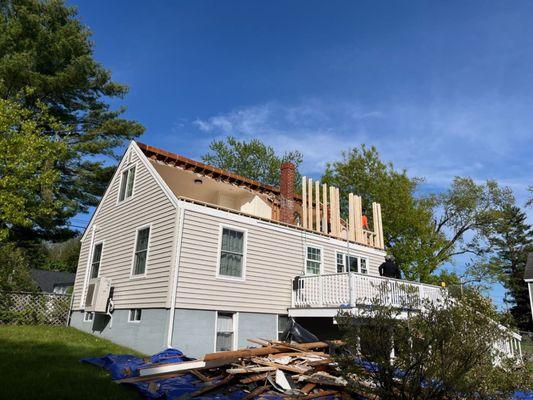 M & Son Construction adding a second story onto this home.