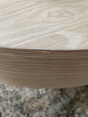 Pealing of table 7 months after purchase and no options to resolve defect.