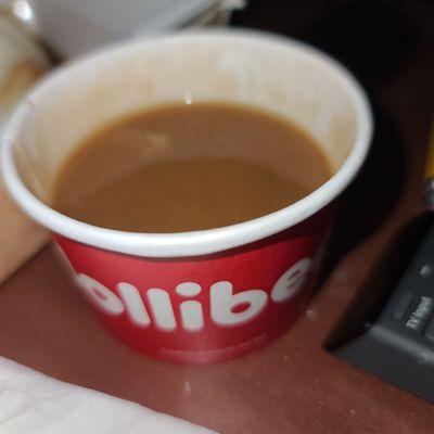 A cup of delicious gravy to dip your chicken in.  Heaven.