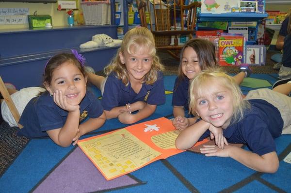 PreK and 1st grade reading buddies.