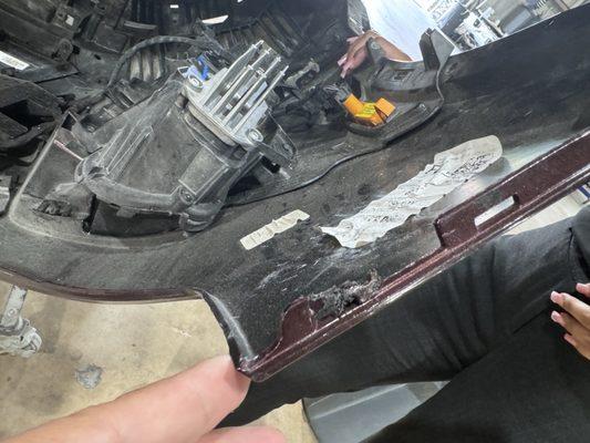 According to Bee Caves Cadillac, the worn out clip lead them to conclude what a wrecked bumper looks like.