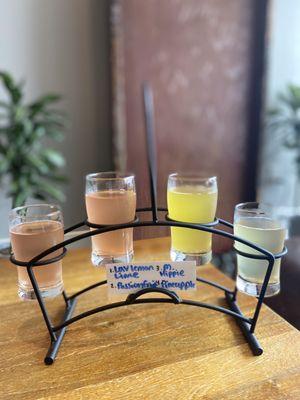 Kombucha Flight: Lavender Lemon Lime, Pink Passion Fruit, Mexican Hippie, and Pineappley Ever After