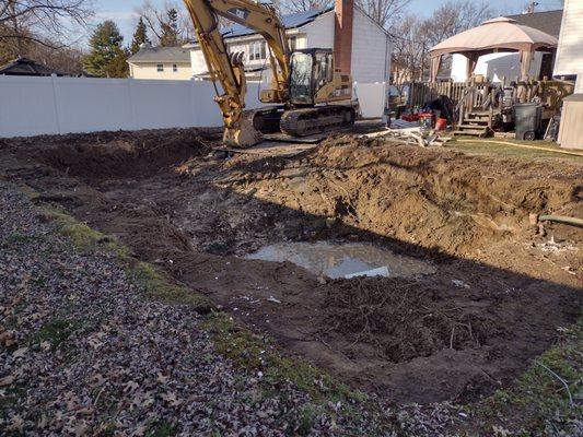 1 day of digging.  It's GONE!  Now, wait for the township inspector.