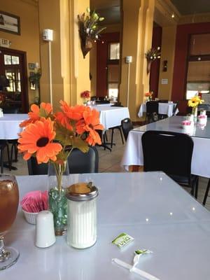 Dining room. Lots of wood, pretty old school interior, quaint and clean, real linen tablecloths and cloth napkins