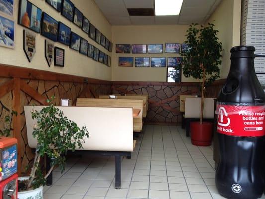 Plentiful booths for a small Main Street shop, with lovely pucs and paintings of Greece.