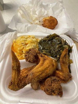 Fried Chicken Wings, Mac and cheese, greens, cornbread muffin.