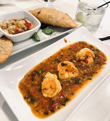 Shrimp in garlic sauce / empanada appetizers