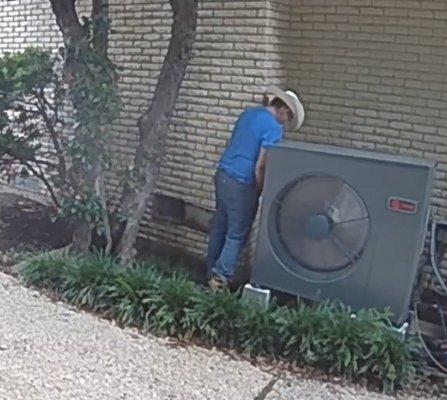 Service Technician urinating on the side of my AC. (He could have just asked to use my bathroom.)