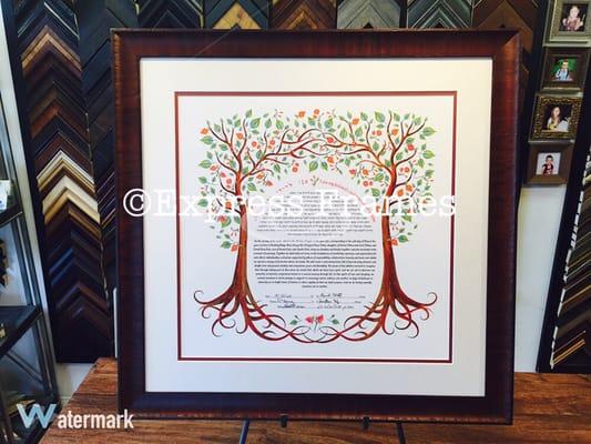 Beautifully framed Ketubah with linen matting and Museum glass