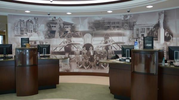 A mural in our lobby featuring old photos of our wonderful Oak Lawn neighborhood.