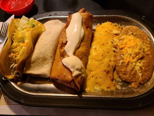 #4 Jalisco Special (Pork burrito, ham flauta, beef taco, cheese enchilada w/ beans)