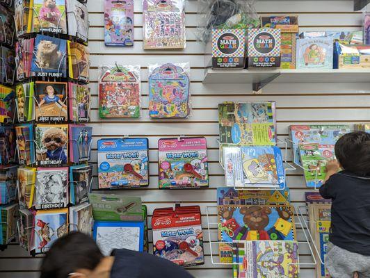 lots of kids toys and games, perfect for them to look at during boring procedural tasks