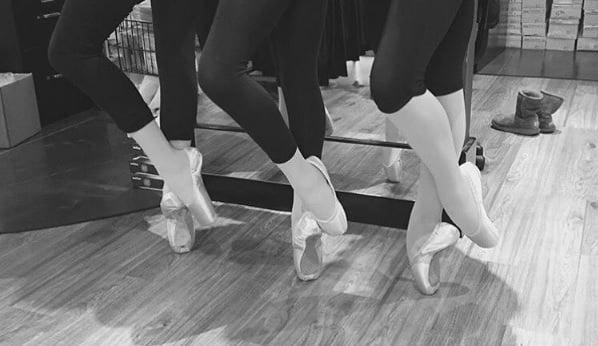 Triple pointe shoe fitting.