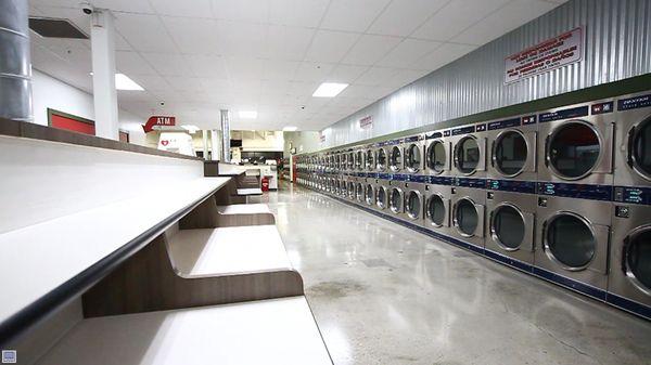 We have 76 (yes, 76!!) dryer machines available for your use.  No more waiting for an open dryer!