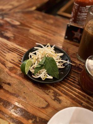 the garnish for 2 bowls of pho (skimpy).