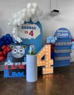 Custom backdrop, decals, and balloons