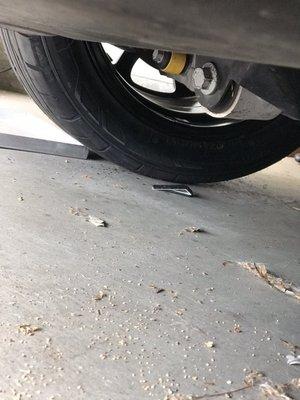 Wheel weights on the ground that also fell off.