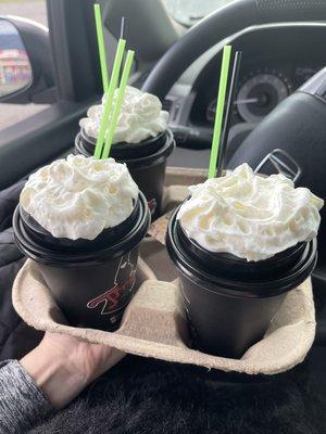 Whip cream on top of lid.