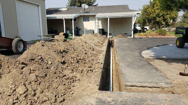 Trenching for leach line installation in Modesto, CA