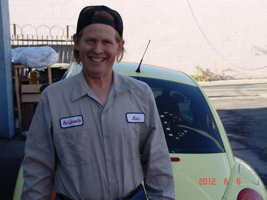 Here is Max at Max's German Car at: 15020 Oxnard st Sherman Oaks CA 91411. He is in front of a 2000 Volkswagen Bettle with a 2.0