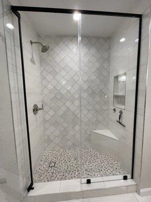 Bathroom remodel- tub replaced with walk in shower and semi frameless shower door.