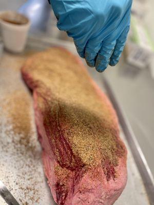 Delicious brisket being expertly prepared in our Texas Star BBQ kitchen. Mouthwatering perfection in the making! #texasbbq #brisket #foodpre