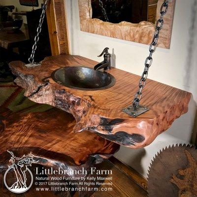 Wood slab vanity in a rustic style   room.