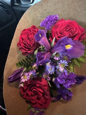 Gift for a friend. Wanted a red roses accompanied by various purple flowers.