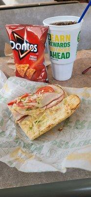 Turkey and ham Italian herbs and cheese bread. Light lettuce tomato black pepper toasted little honey mustard combo