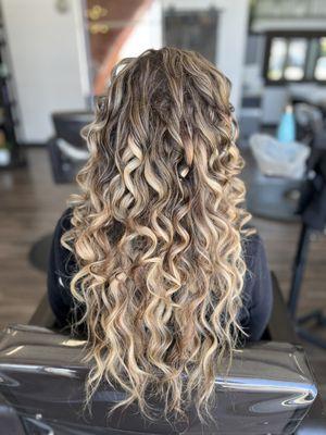 20"Hair extensions on curly short hair.