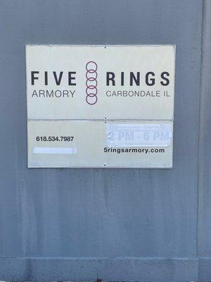 Phone number and website on door