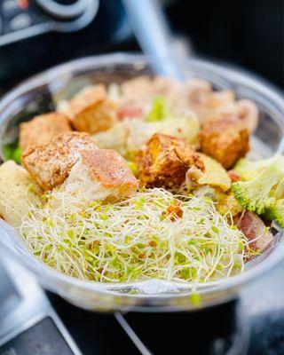 Curry tofu, Cesar, sprouts & raw veggies off the self serve Salad bar to go! YUM! :)..