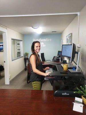 Team Member Ashley Harrington at her standing desk!