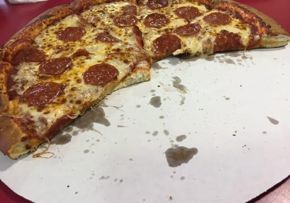 Half of a $33.99 pepperoni pizza. Not worth it!