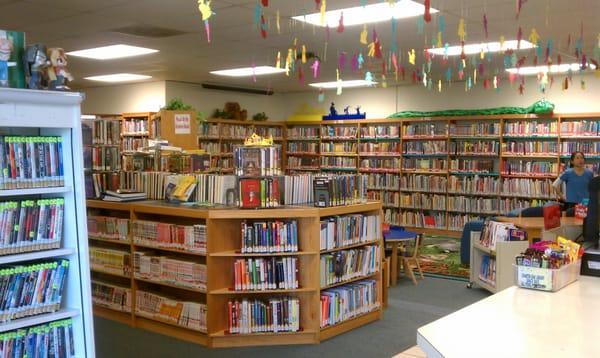 Manga & New Books shelf, behind is the children's area.