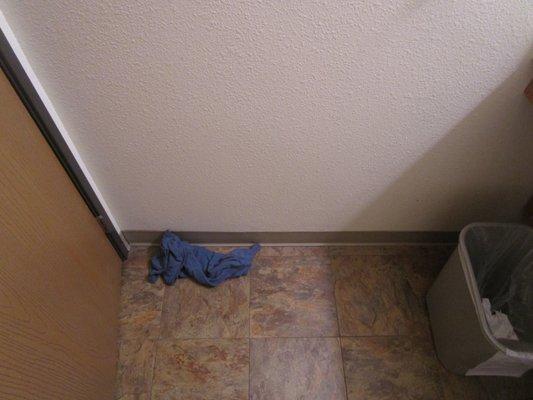 Leftover clothing in bathroom from previous tenant.