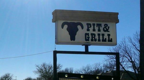 Pit & Grill restaurant sign