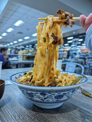 Stir Fried Cumin Lamb w/ Hand Ripped Noodle ($17)