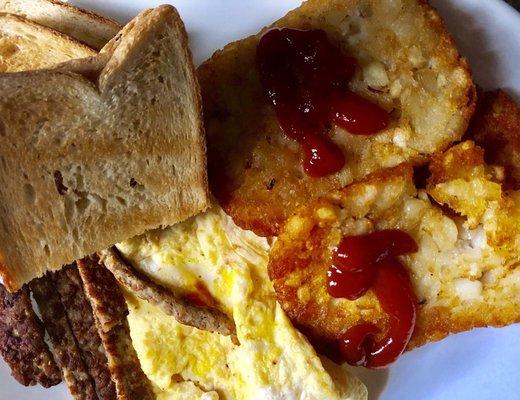 The sausage, scramble, and hash brown platter comes with toast. $6