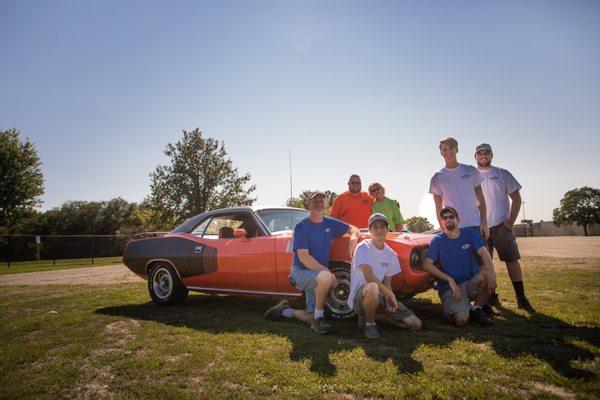 This is my 71 Hemi Cuda with Keith's crew after they made the car right as rain.