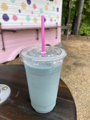 Tarheel latte: caffeine-free buttertly pea tea sweetened with lavender, milk, over ice