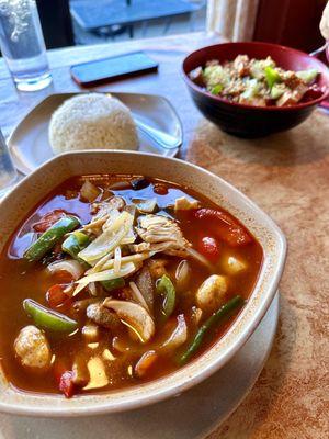 Fiery Tom Yum soup with chicken.