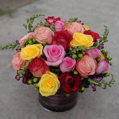 assorted roses in cylinder. designed by allison g. ($125 plus delivery)