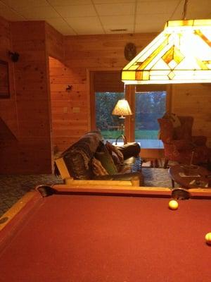 Wooden Indian-lower level living area (pool table, ps2, DVD, Bose speakers, dart board, W/D, iron, games, movies, books etc.)