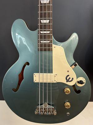 Very good condition and 2021 Epiphone Jack Casady signature bass in striking Faded Pelham Blue.  With HSC - $625