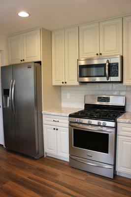 TIle backsplash and floors installed by Rafael and his team