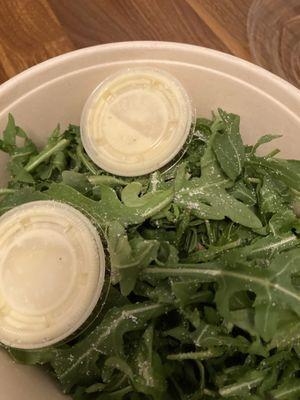 Sad bowl of just arugula