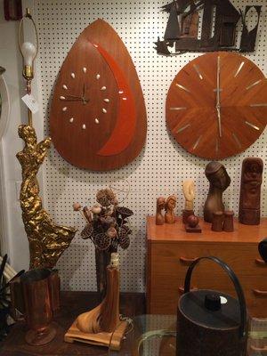 Amazing Guitar Pick Wall Clock and Round Herman Miller Wall Clock. Brutalist sculptural lamp and sculptures.